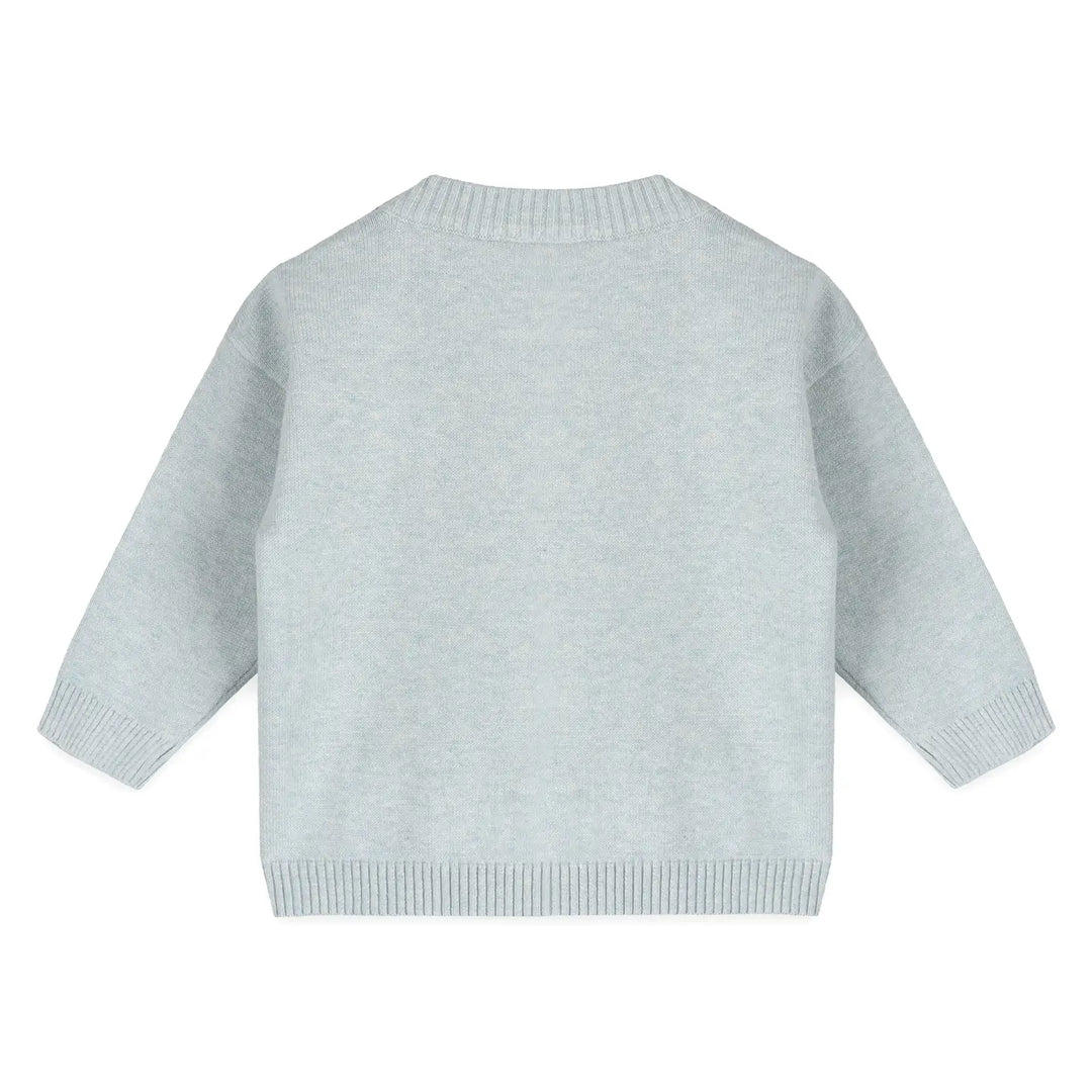 Light blue sweater on a white background