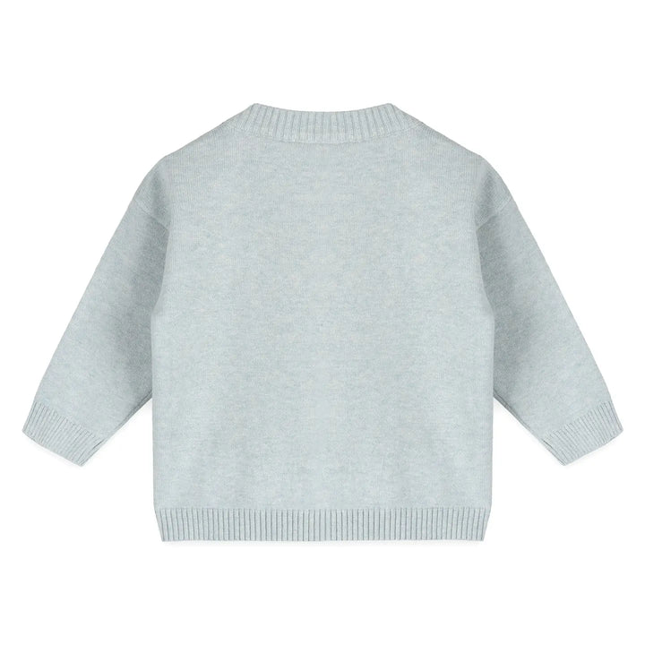 Light blue sweater on a white background