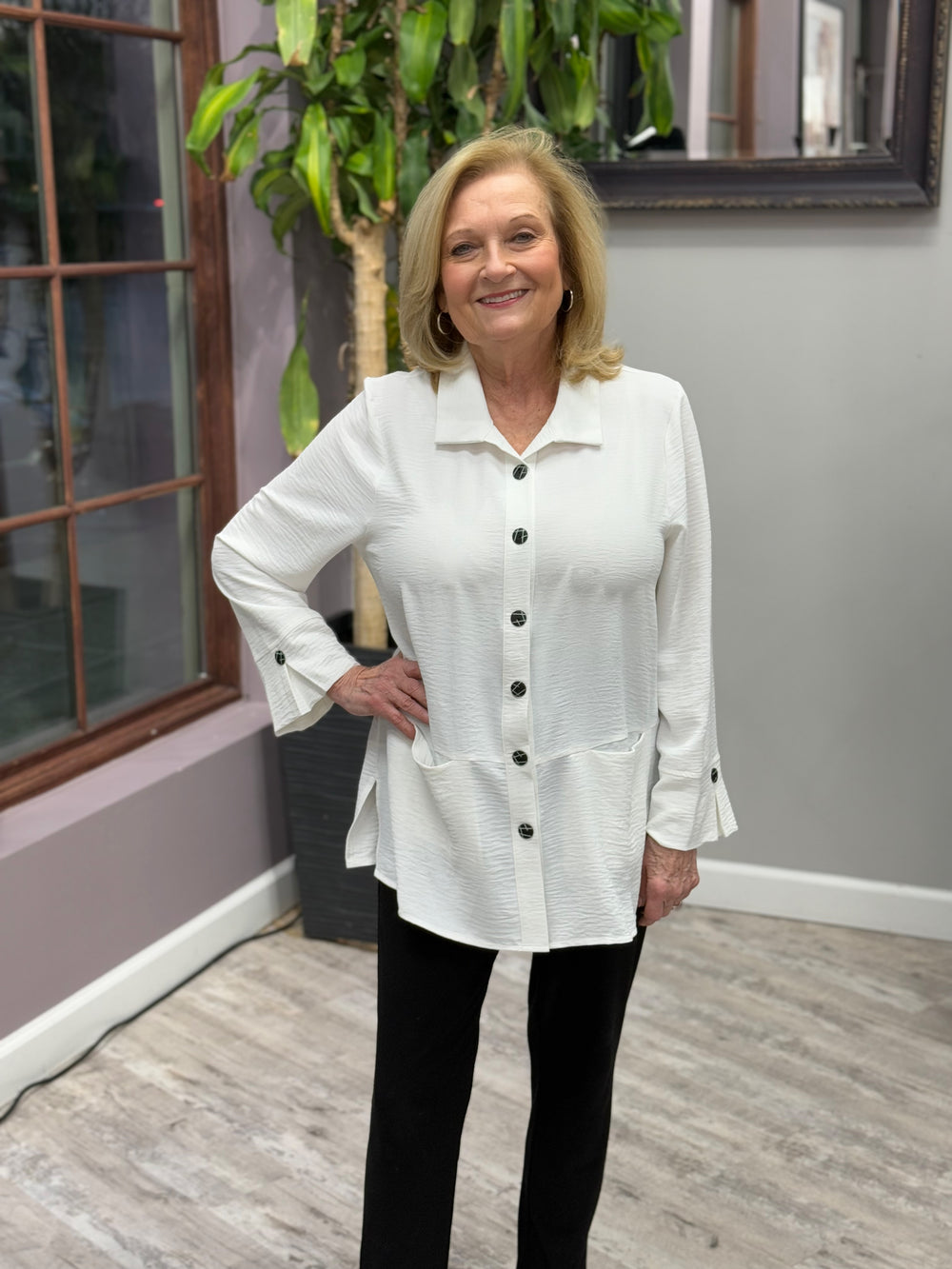 Lightweight white button down tunic with pockets.