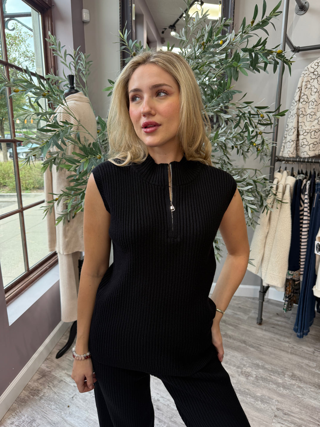 St. Moritz Ribbed Zip Mock Neck Tank in black with half-zip mock neck, waist-up front view