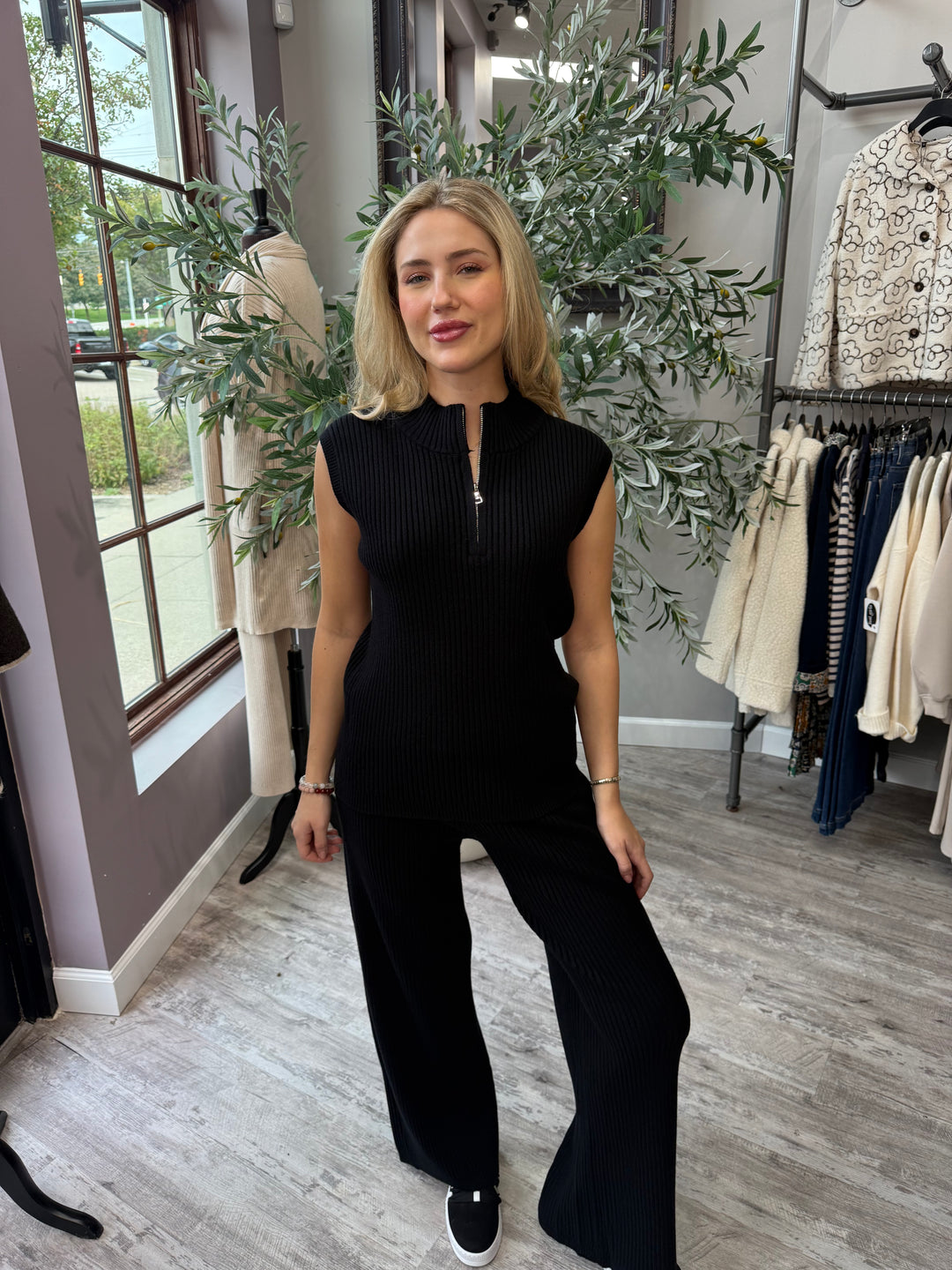 St. Moritz Ribbed Zip Mock Neck Tank in black with matching knit pant, front view