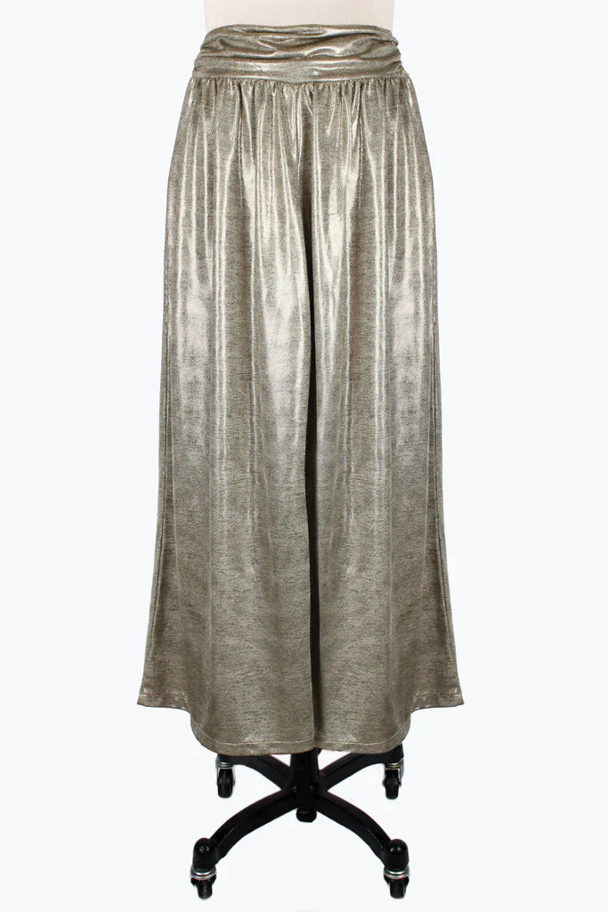 Long metallic skirt on a white background