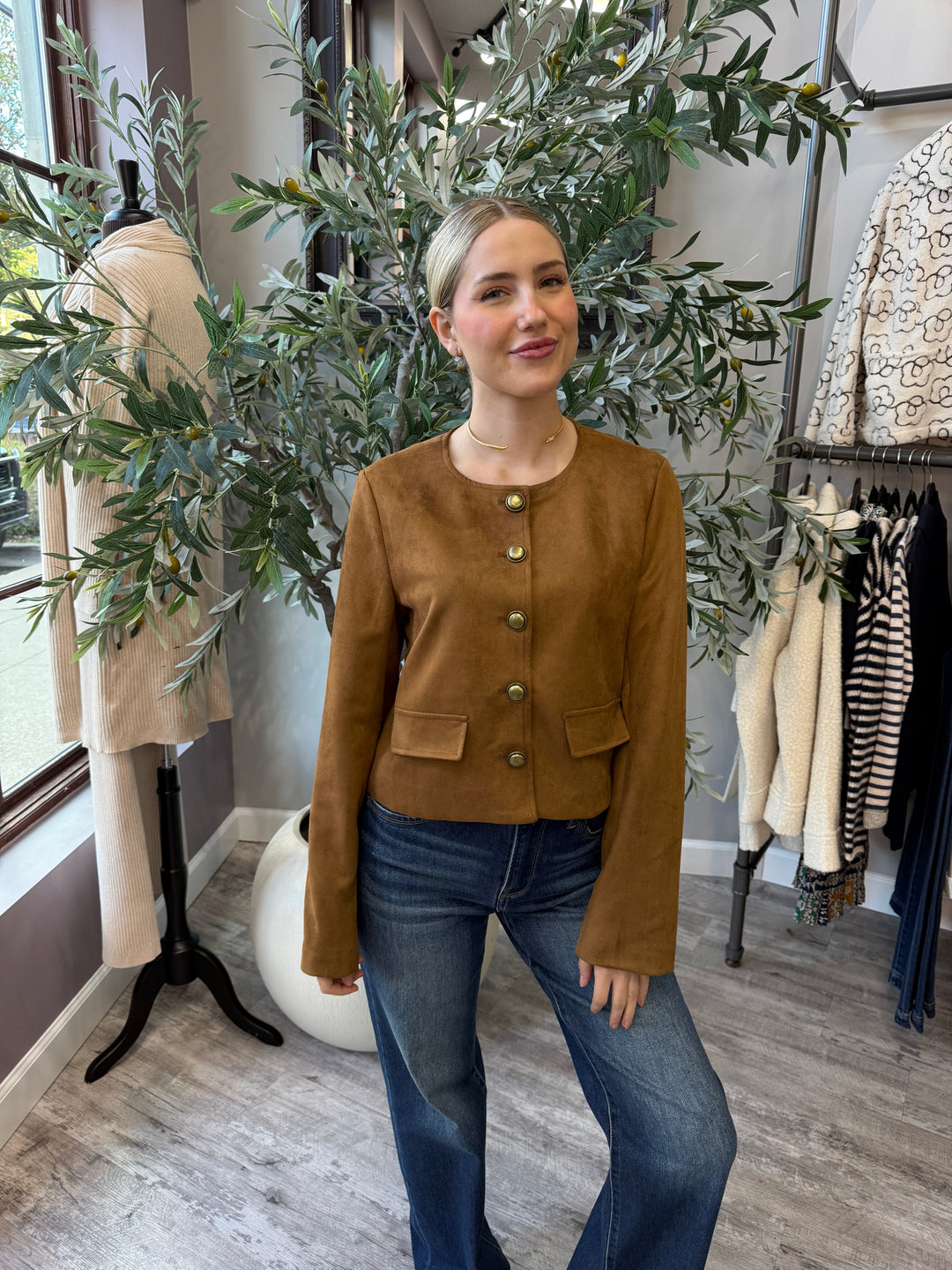 Lana Faux Suede Jacket in brown with gold buttons and flap pockets, front view with wide leg jeans