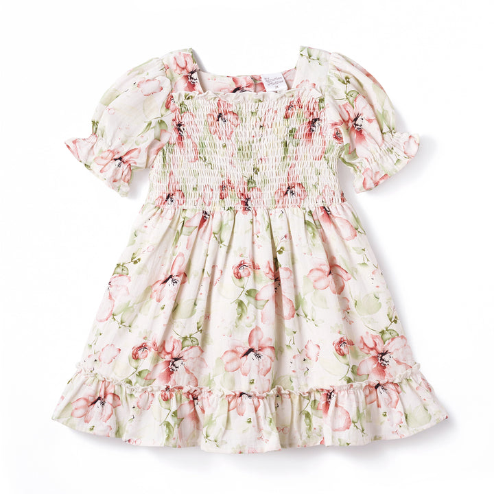 Floral dress with ruffled sleeves and hem on a white background