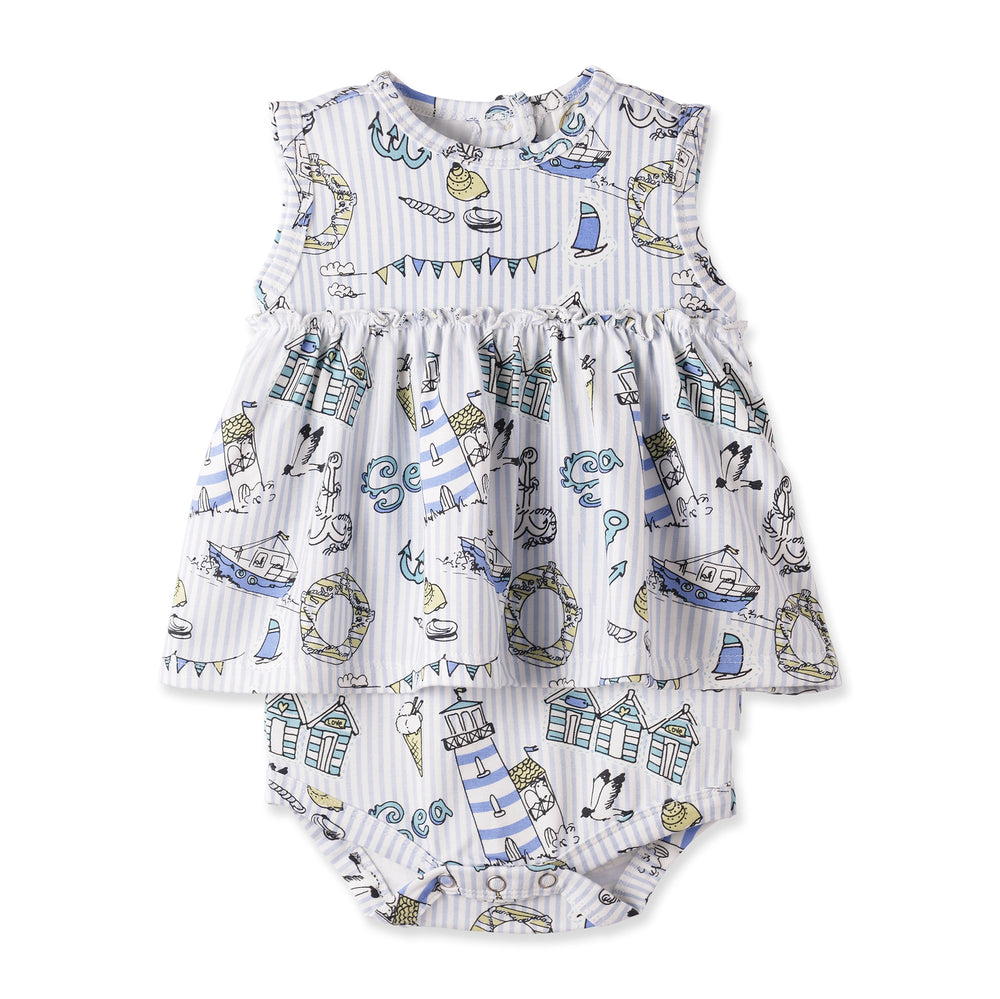 Baby romper with nautical pattern on a white background
