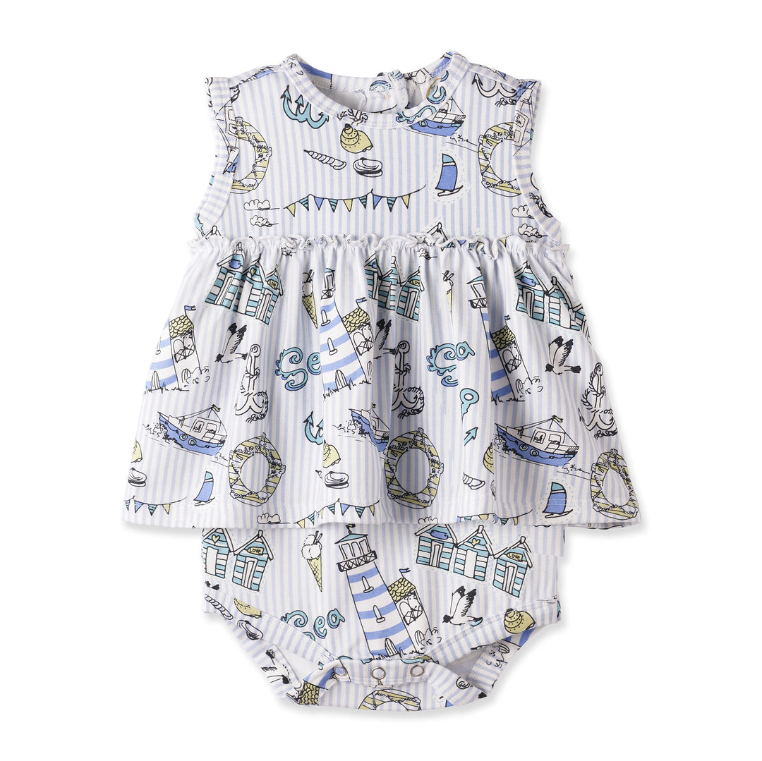 Baby romper with nautical pattern on a white background
