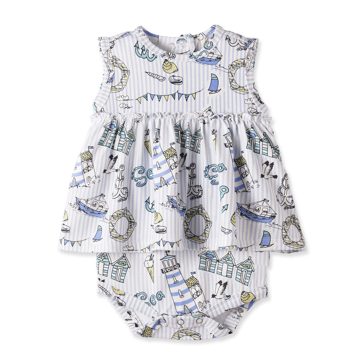Baby romper with nautical pattern on a white background
