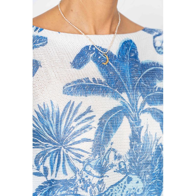 White off-shoulder top with blue palm leaf pattern