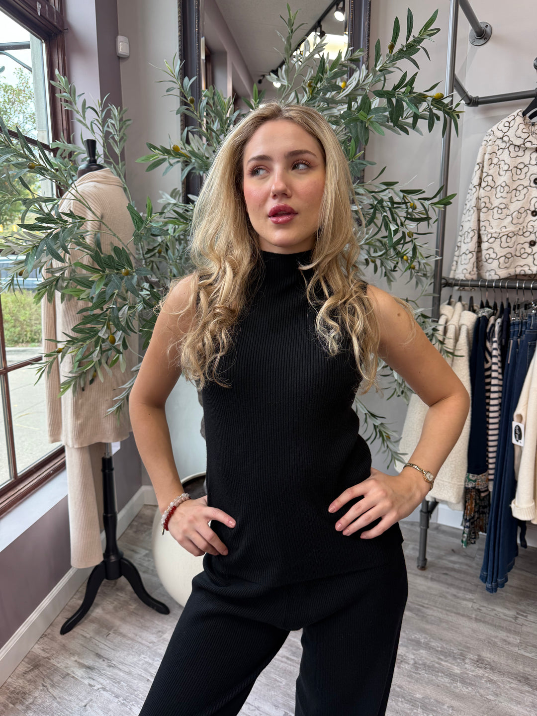 Rumi Ribbed Wide Leg Pant in black with matching mock neck top, waist-up front view