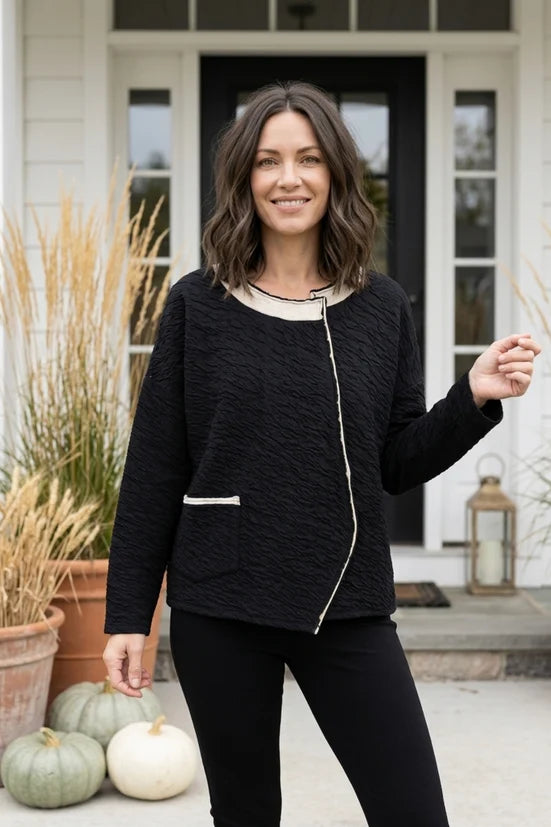 Metro Pullover in Black - asymmetrical crossover front detail