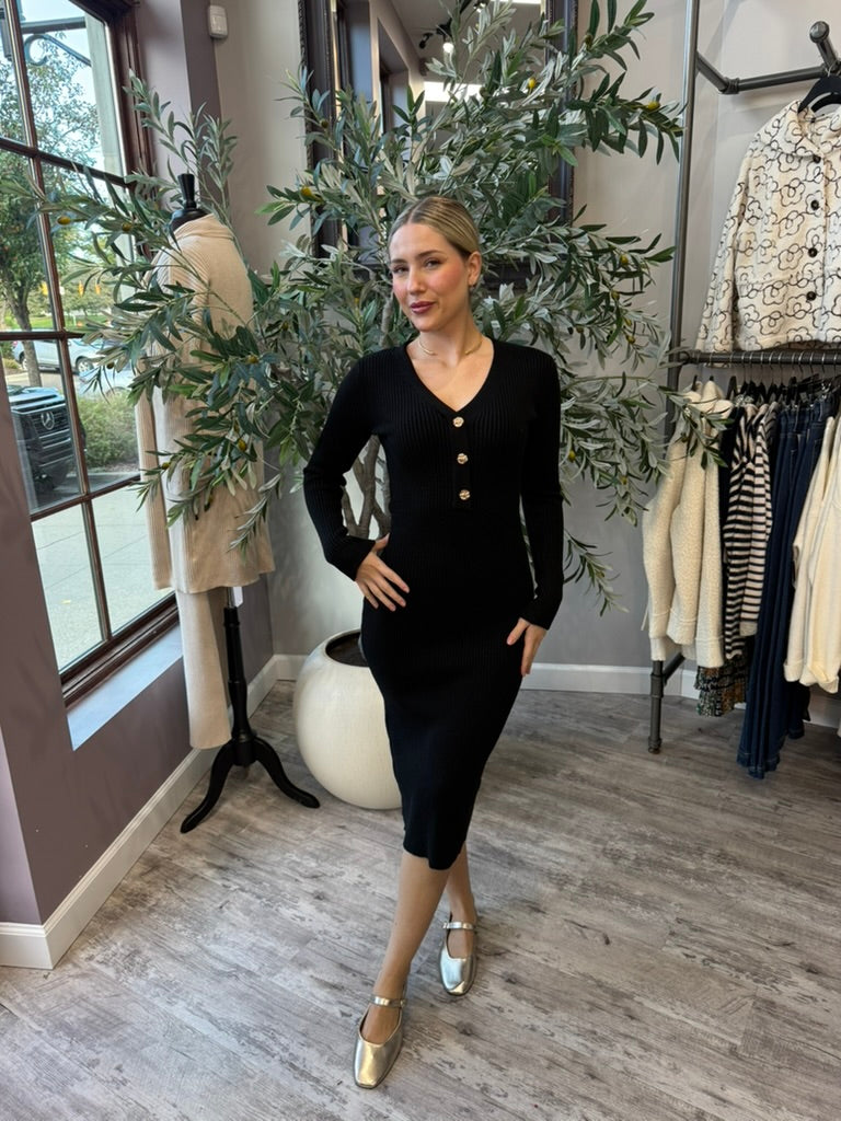 Rory Ribbed Sweater Dress in black V-neck midi with gold buttons, front view