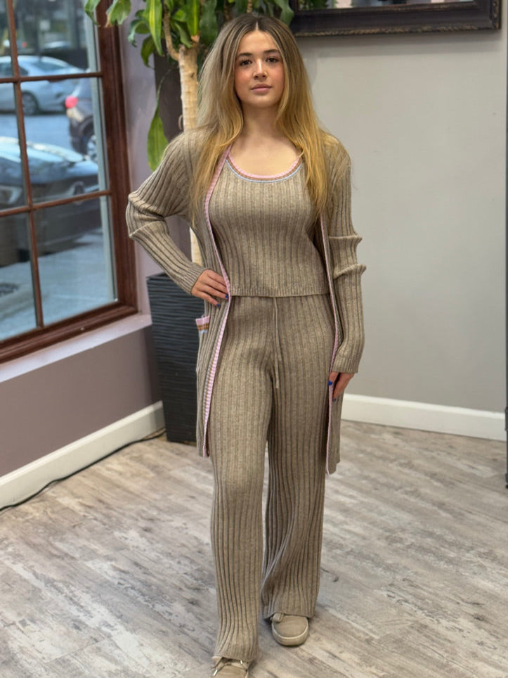 Women's ribbed lounge set in taupe, featuring a long cardigan with lavender trim, a cropped tank top, and matching wide-leg pants. Perfect for cozy, stylish relaxation.