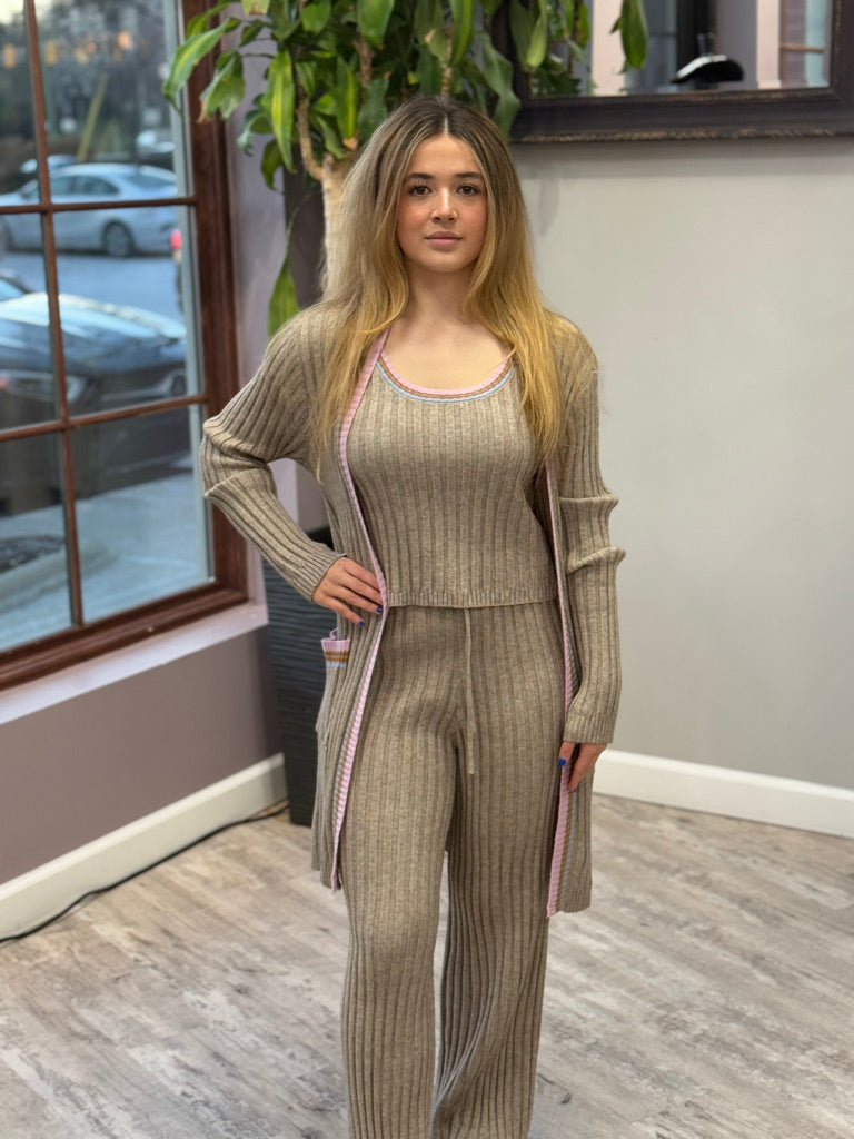 Women's ribbed lounge set in taupe, featuring a long cardigan with lavender trim, a cropped tank top, and matching wide-leg pants. Perfect for cozy, stylish relaxation.