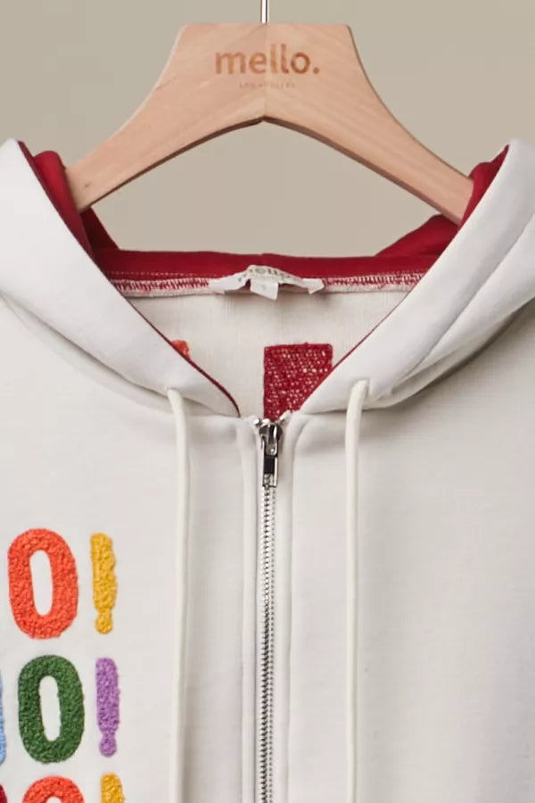 Ho Ho Ho Zip Hoodie close-up of red-lined drawstring hood and zip front
