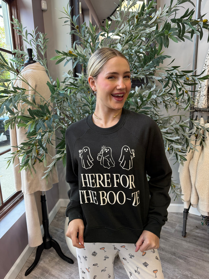 Here for the Boo-ze Sweatshirt in black with cream ghost trio graphic, front view