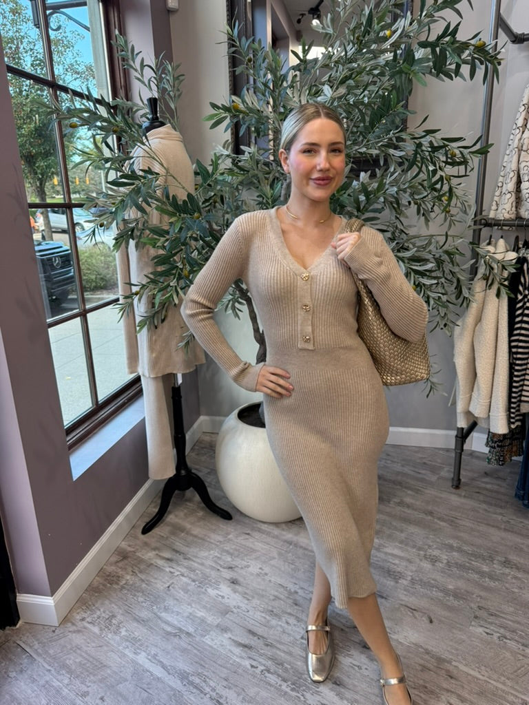 Rory Ribbed Sweater Dress in beige ribbed midi, full-length front view with metallic flats
