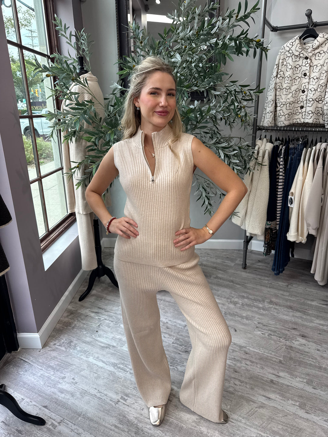 St. Moritz Ribbed Knit Pant in beige wide leg styled with matching sleeveless zip top, front view
