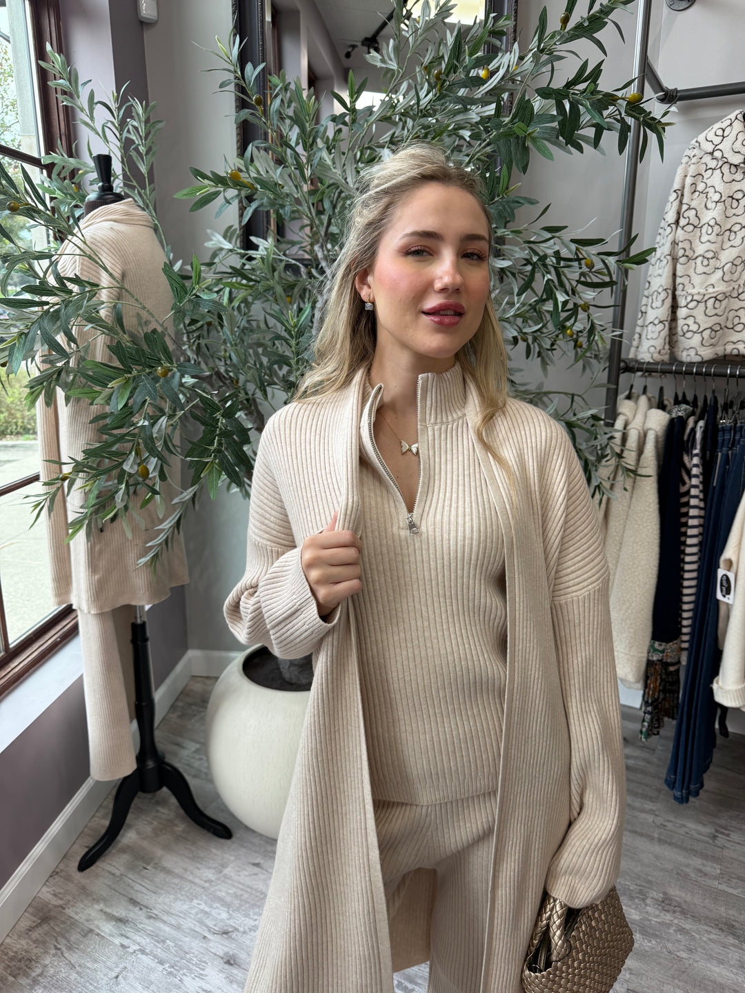 St. Moritz Ribbed Open Cardigan in beige ribbed knit over matching zip tank, front view