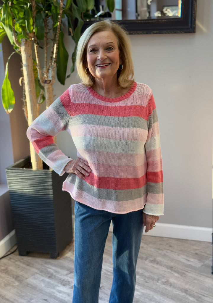 Pink striped lightweight sweater.