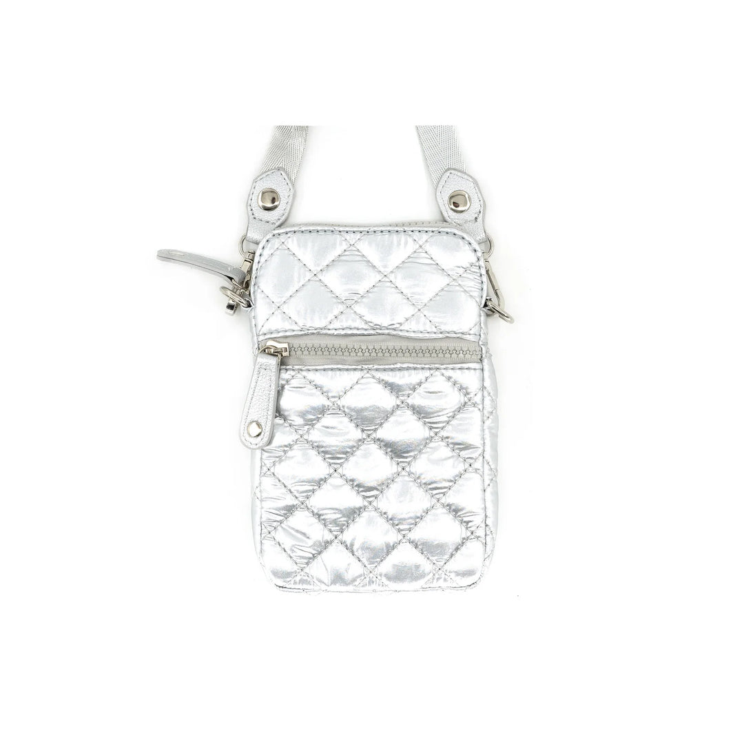 Silver quilted crossbody bag on a white background