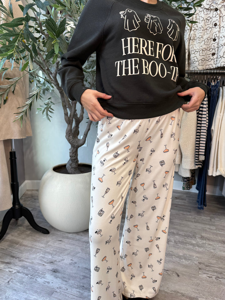 Boo-zy Pajama Pants in ivory cocktail glass print, front view of relaxed wide leg