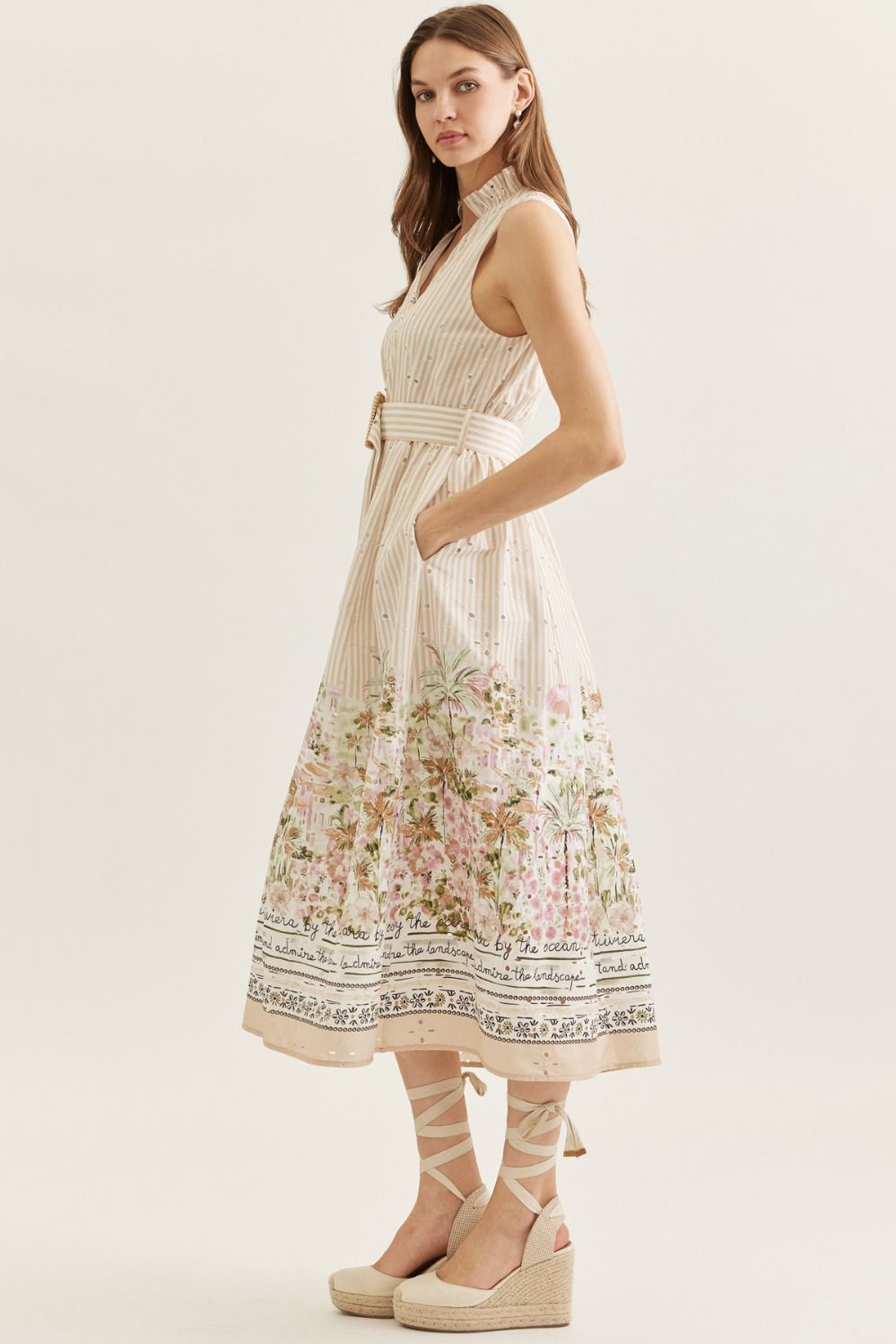 Woman wearing a floral dress on a white background
