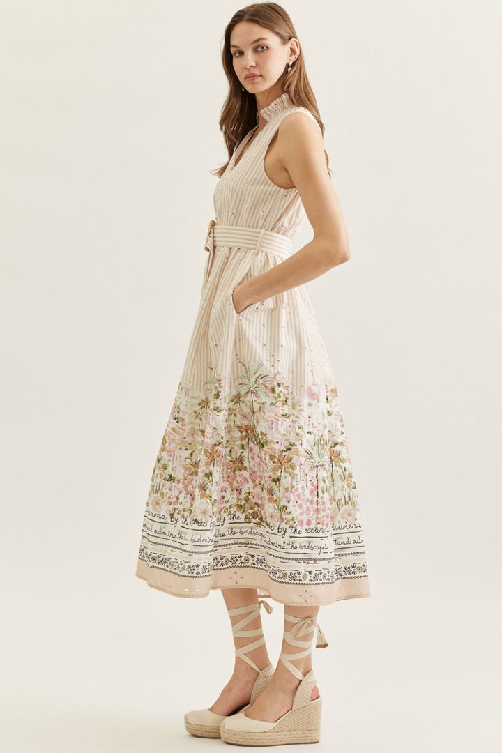Woman wearing a floral dress on a white background