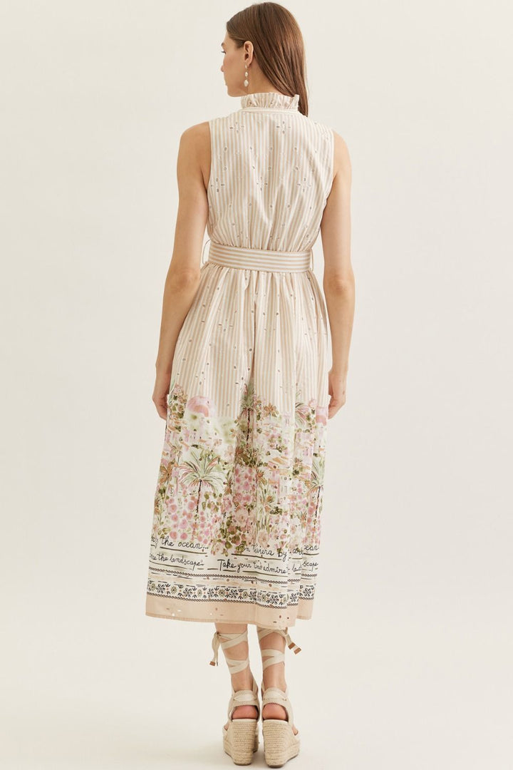 Woman wearing a floral dress with a white background