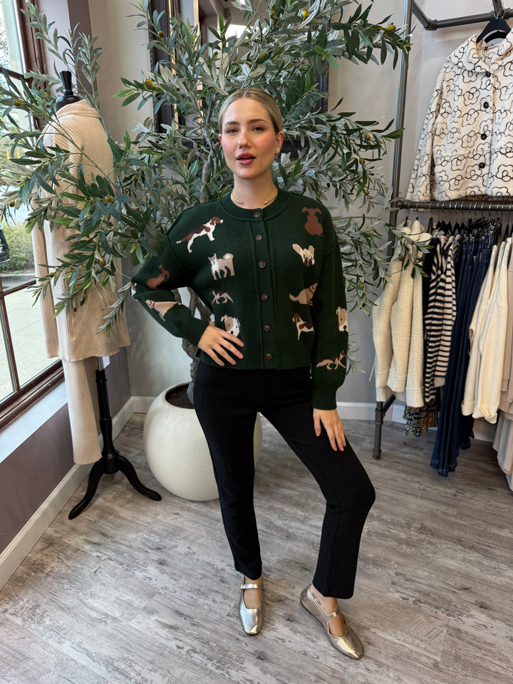 Best in Show Cardigan in pine green, full-length front view styled with black pants and metallic flats