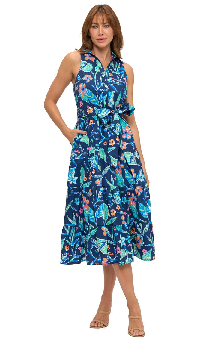 Woman wearing a blue floral dress on a white background