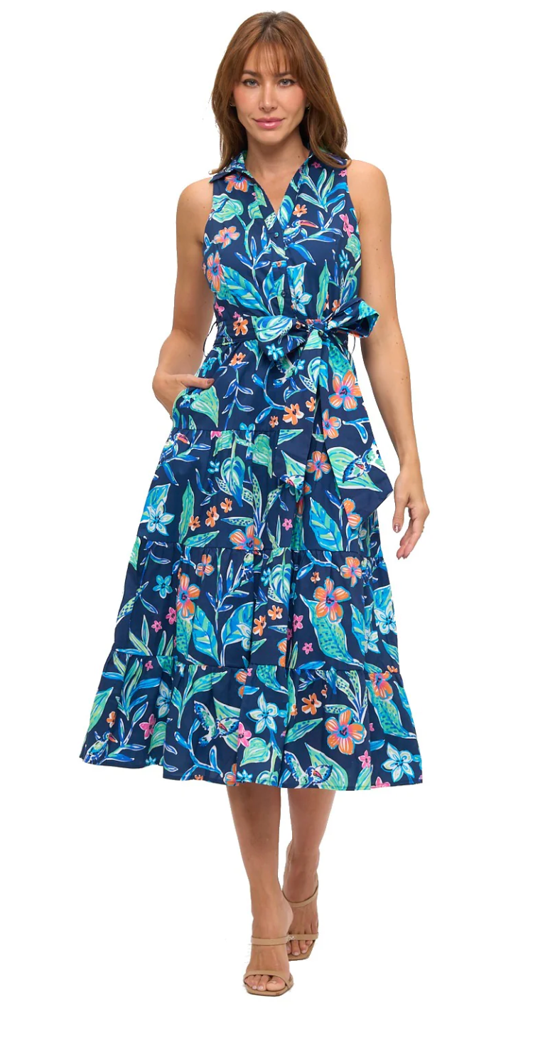Woman wearing a blue floral dress on a white background