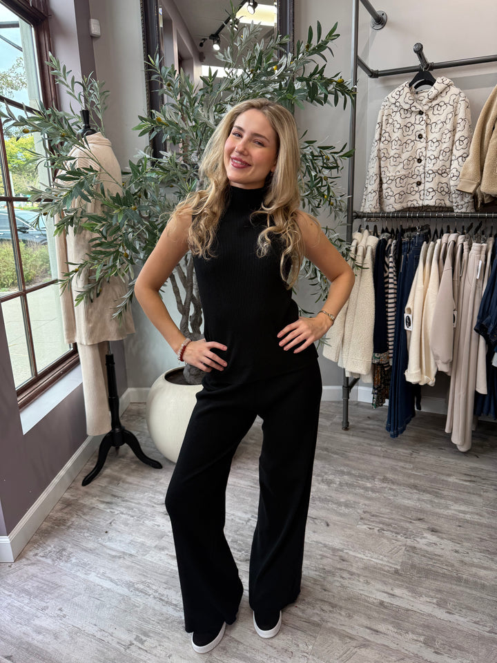 Rumi Ribbed Wide Leg Pant in black ribbed knit with matching top, full-length front view