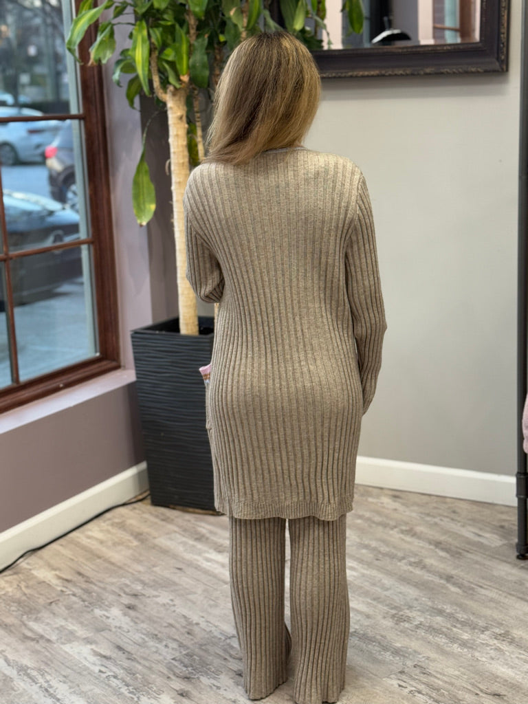 Women's ribbed lounge set in taupe, featuring a long cardigan with lavender trim, a cropped tank top, and matching wide-leg pants. Perfect for cozy, stylish relaxation.