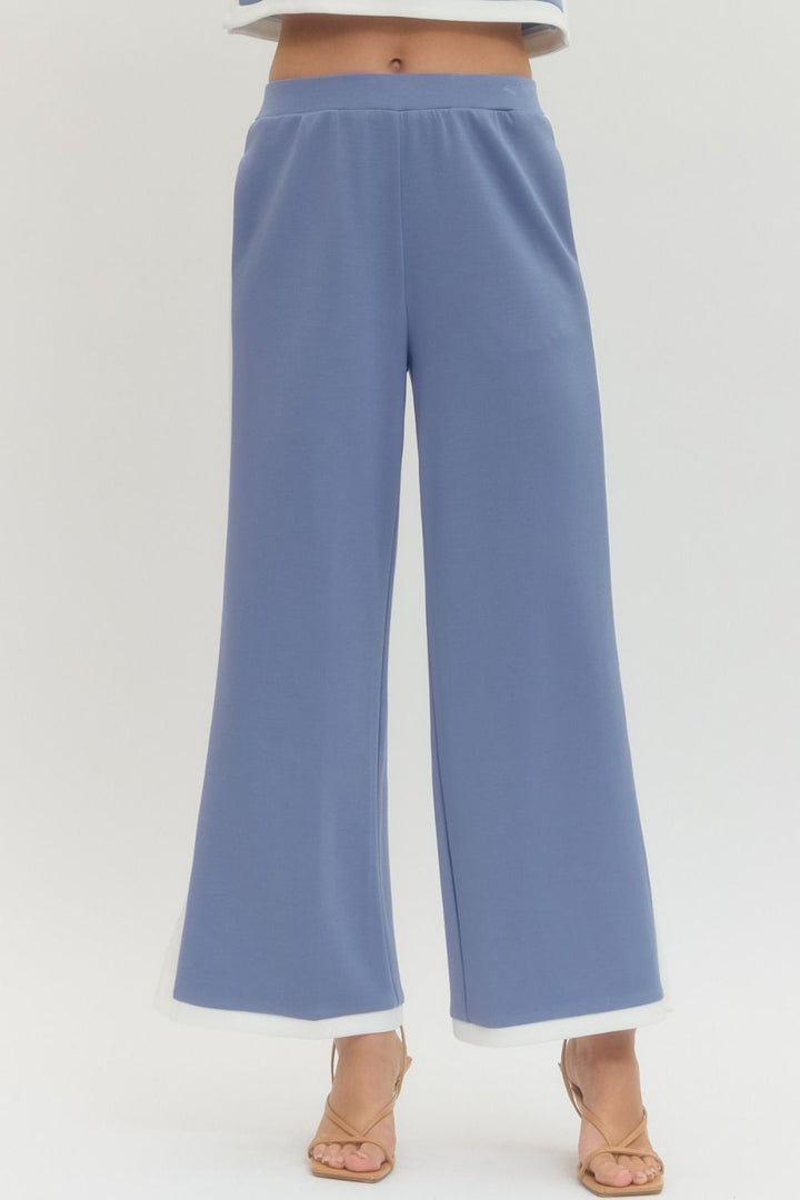 Blue wide-leg pants on a white background