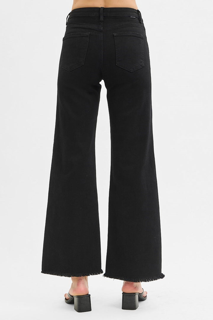 Black wide-leg jeans on a white background
