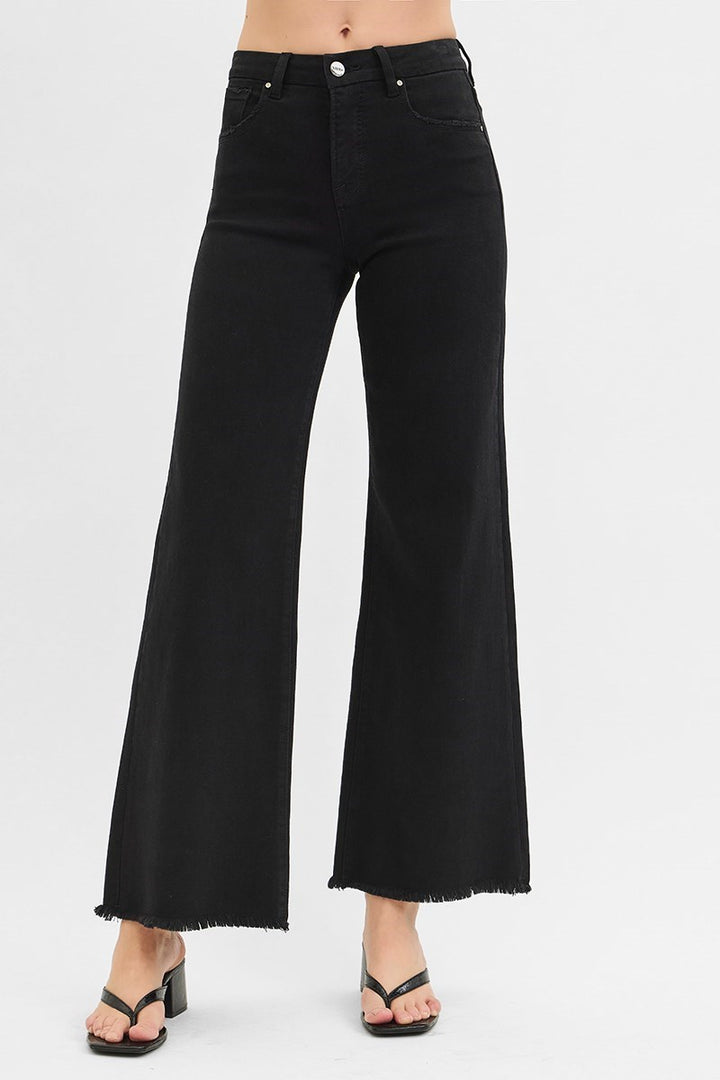 Black wide-leg jeans on a white background
