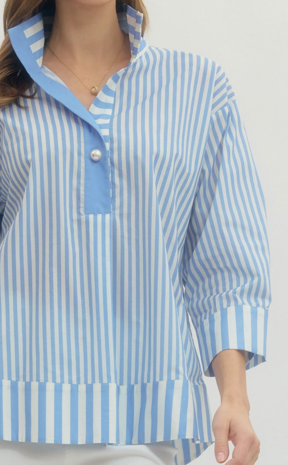 Blue and white striped shirt with a collar on a plain background