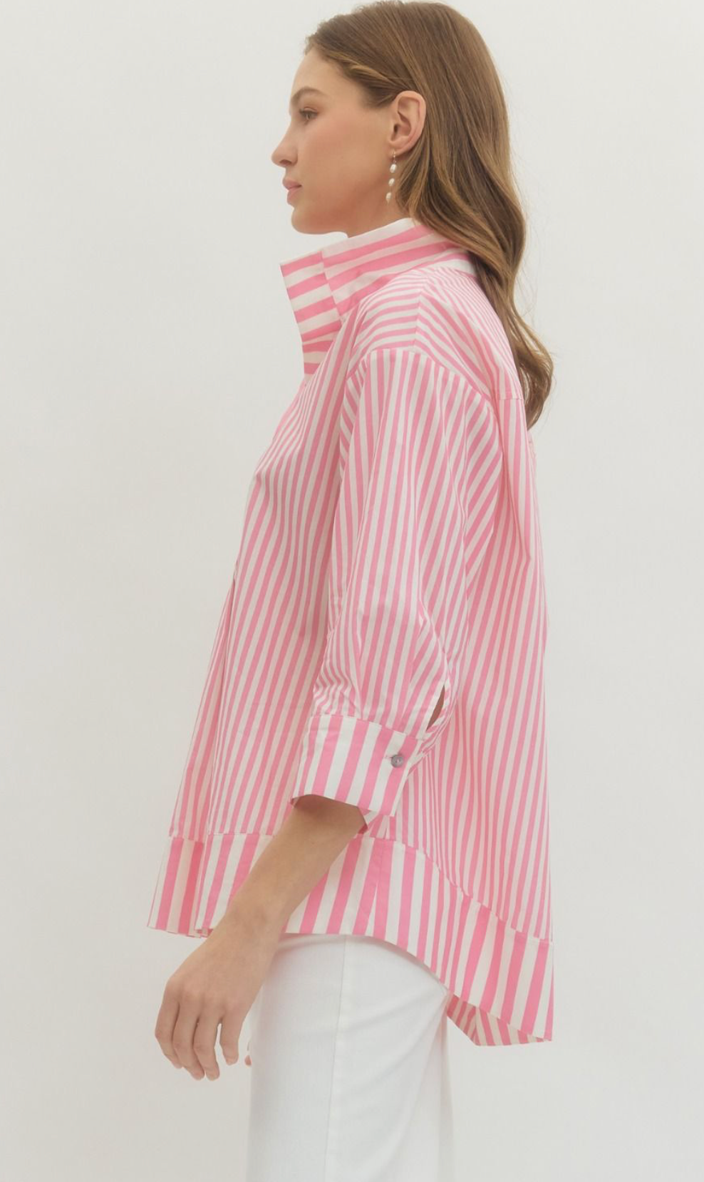 Woman wearing a red and white striped shirt on a white background