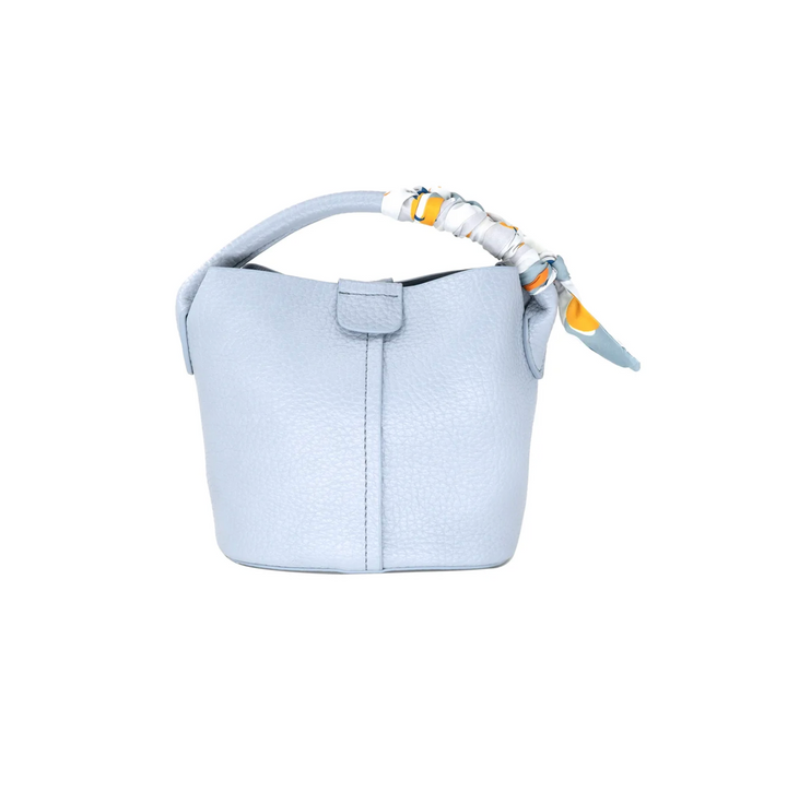Light blue handbag with a strap on a white background