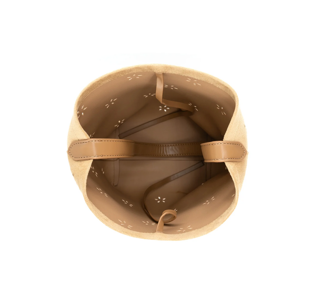 Brown leather bag with floral patterns on a white background