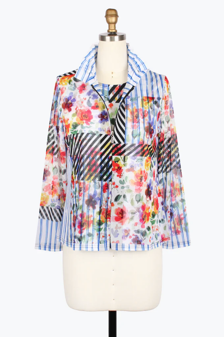 Multicolored floral and striped shirt on a mannequin against a white background