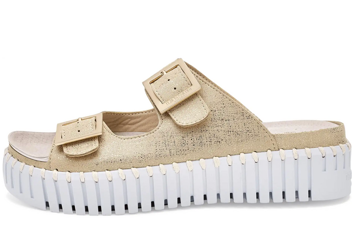 Beige sandal with white sole on a white background