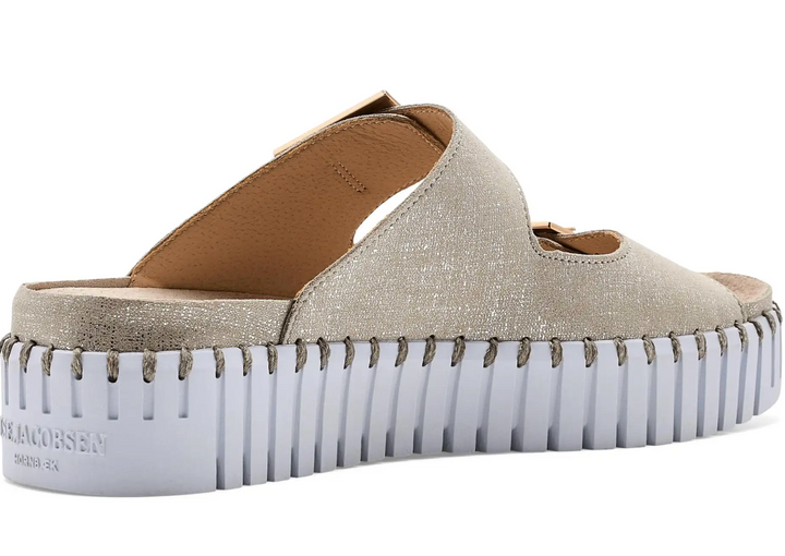 Beige slip-on shoe with white sole on a white background