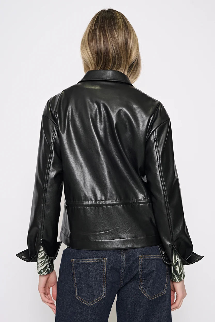 Back view of the black Rebel Faux Leather Jacket showing the relaxed boxy fit, shirt collar, and snap cuffs