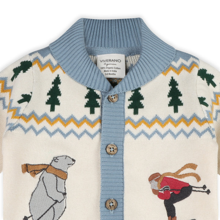 Fair Isle-inspired diamond detailing and blue trim on the Alpine Snow Baby Cardigan
