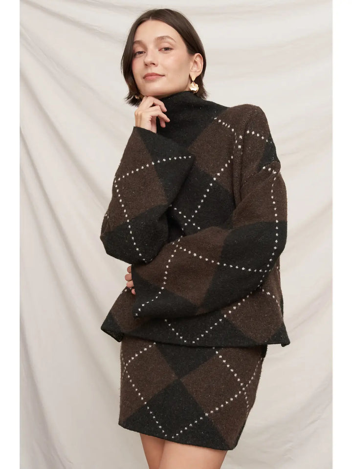 Autumn Argyle Sweater in brown and black argyle, three-quarter front view