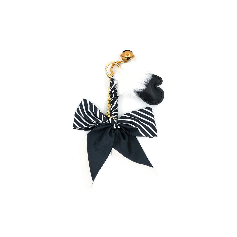 Belle Bow Bag Charm in Black with striped scarf bow, faux fur pom and gold hardware