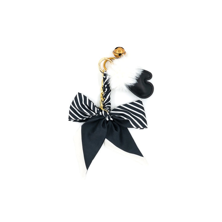 Belle Bow Bag Charm in Black with striped scarf bow, faux fur pom and gold hardware