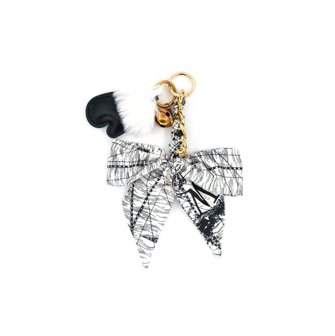 Belle Bow Bag Charm in Grey with printed scarf bow, faux fur pom, black heart and gold bell