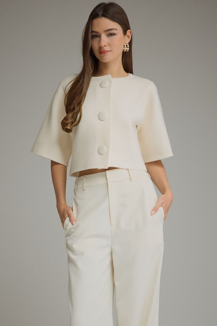 Bianca Button Cardigan in cream with oversized covered buttons, front view